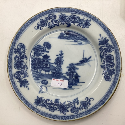 153 - Four Oriental style blue and white plates