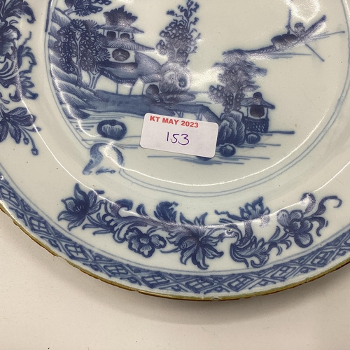 153 - Four Oriental style blue and white plates