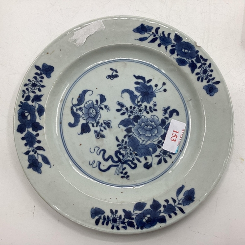 153 - Four Oriental style blue and white plates