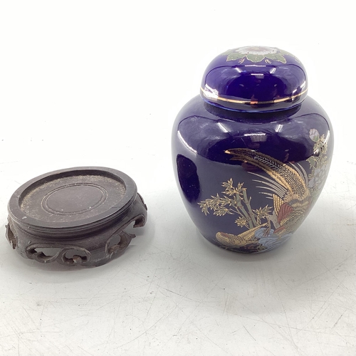 157 - Three oriental style ceramic items to include a hand decorated dish, ceramic teapot on stand (3)