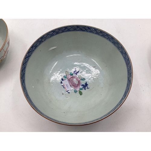 158 - Four oriental style bowls of different designs, one with four character mark within double blue circ... 