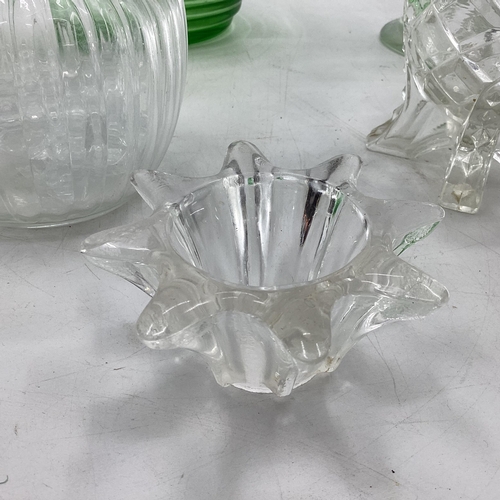 159 - A Collection of moulded glassware to include a ribbon uranium glass lemonade jug and other items