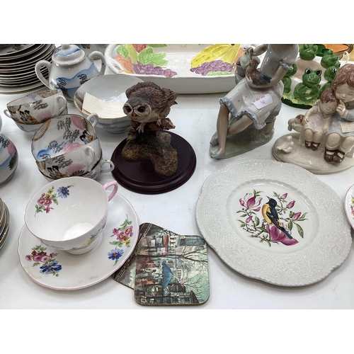 161 - A collection of C20th ceramics to include a Noritake egg shell tea set, Nao figurine, and other item... 