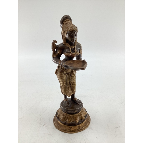 177 - A South Asian bronze figure of Deepa Lakshmi (representation of the Hindu Goddess Lakshmi) symbol of... 