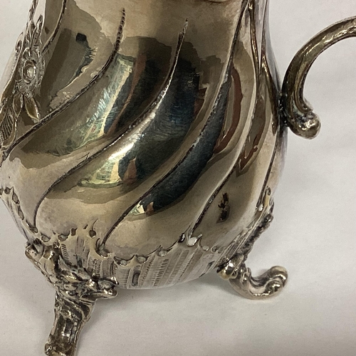 18 - A sterling silver cream jug, Continental and Sterling silver marks, Edwin Thompson Bryant, London 18... 