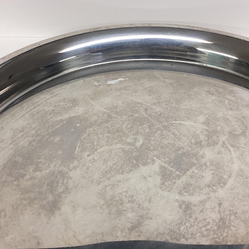 210 - A Moet and Chandon stainless steel circular tray 36 x 25cm