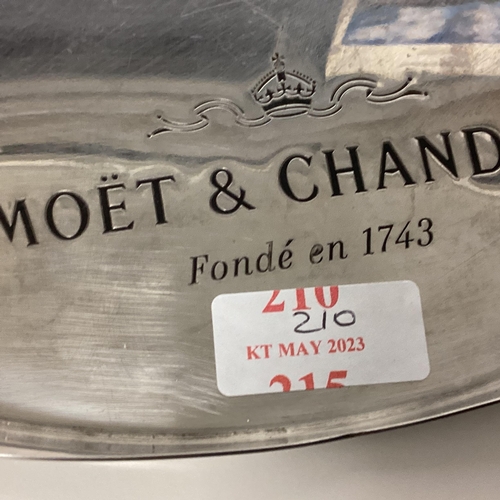 210 - A Moet and Chandon stainless steel circular tray 36 x 25cm