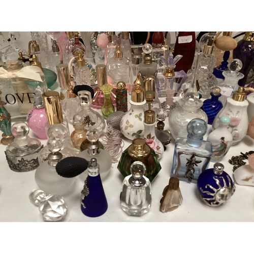 214 - A large collection of perfume bottles mid to late C20th (quantity)