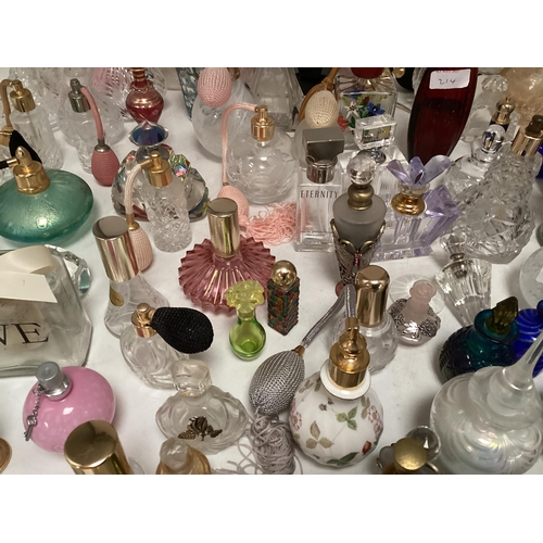 214 - A large collection of perfume bottles mid to late C20th (quantity)