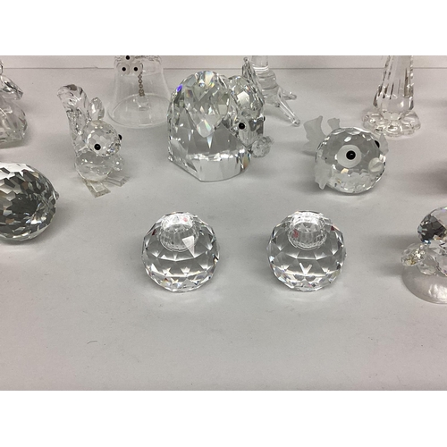 217 - A large collection of Swarovski glass ornaments