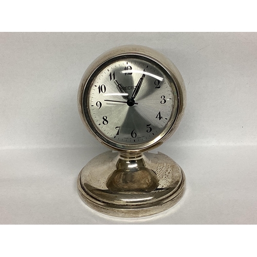 23 - A Sterling silver mounted desk clock by Kemp Bros, Chester, 1927