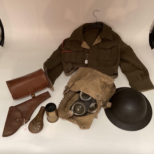 247 - A World War II period military issue long hose gas mask with original haversack and accessories, bro... 