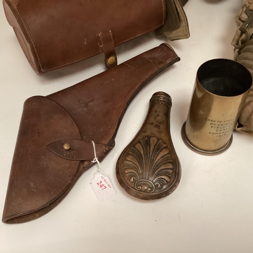 247 - A World War II period military issue long hose gas mask with original haversack and accessories, bro... 