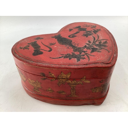 273 - A pair of C19th style Chinese, lacquer and gilt heart shaped boxes with black lacquer interiors, 31 ... 