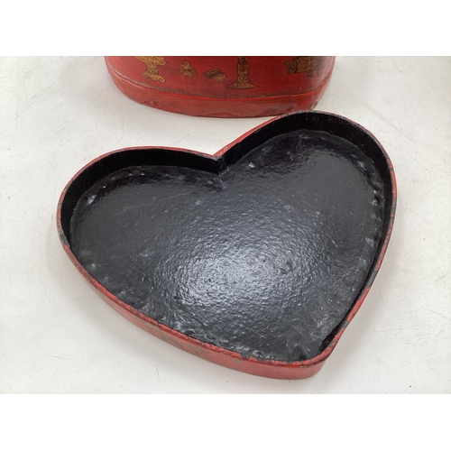 273 - A pair of C19th style Chinese, lacquer and gilt heart shaped boxes with black lacquer interiors, 31 ... 