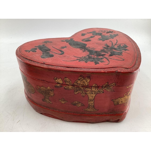 273 - A pair of C19th style Chinese, lacquer and gilt heart shaped boxes with black lacquer interiors, 31 ... 