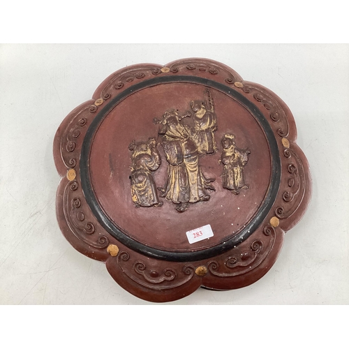 283 - A Chinese C19th Style round lacquered sectional box with lid bearing faded out figures, 41 x 7xm