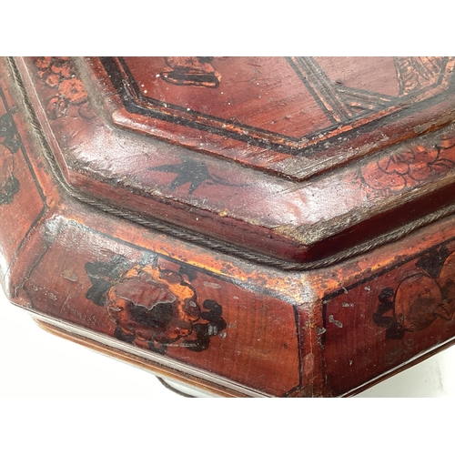 287 - A C19th style Chinese lacquer rice box, of octagonal form with curved handle