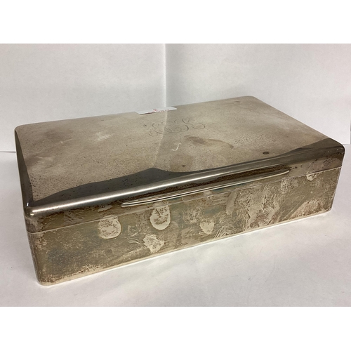 3 - A large sterling silver cigarette box, with cedar lining, 23 x 13 x 6cm, by Goldsmiths Silversmiths ... 