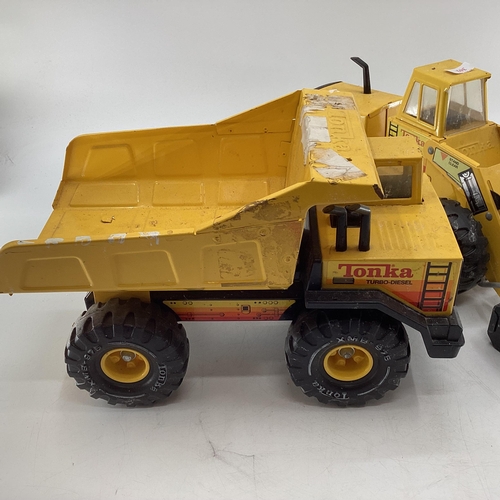 302 - Two 1970x/80s large tin plate Tonka Toys, (tipper truck and bulldozer)