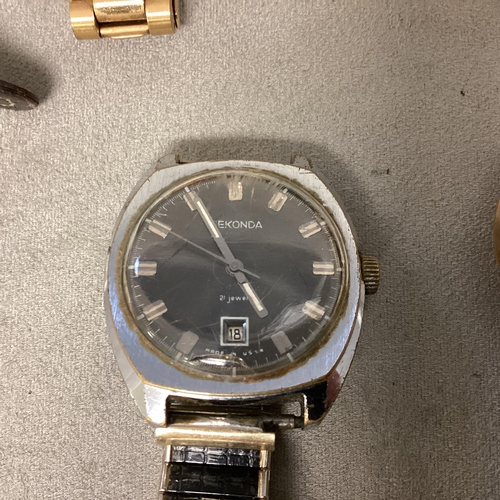 31 - A collection of vintage gents` wristwatches, A Garrard 17 Jewel Incabloc, an Aristo Automatic, An In... 