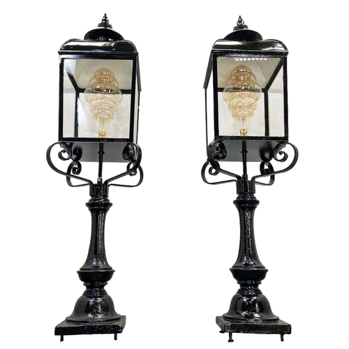 311 - A good pair of cast metal external pedestal lanterns, circa 1900, been recently restored and rejuven... 