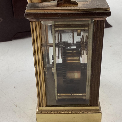 325 - Collection of 4 carriage clocks, and a 1930s 8 day mantle clock with Bakerlight case