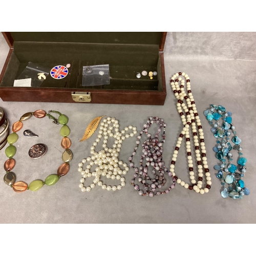 33 - A collection of costume and bead jewellery