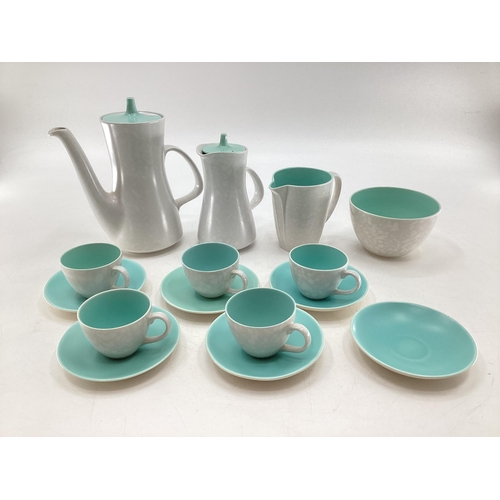 331 - Mid century Poole pottery coffee set to include 5 cups, 5 saucers, cream sugar coffee and hot water