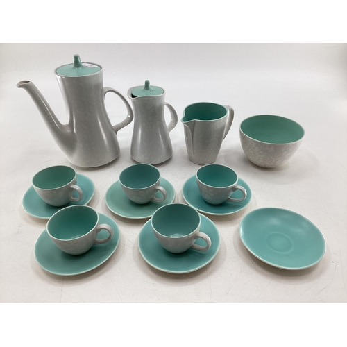 331 - Mid century Poole pottery coffee set to include 5 cups, 5 saucers, cream sugar coffee and hot water