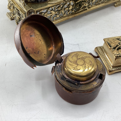 333 - Brass desk tidy/inkwell with two ceramic inkwells and lidded recess for stamps, together with brass ... 