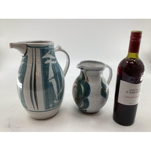 337 - Alan Caiger-Smith, two water jugs of similar design 27cm H and 19cm H monogrammed to base; Aldermars... 