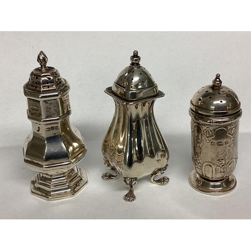 36 - Three Sterling silver pepperettes, together with a silver sovereign case and silver cigarette case, ... 