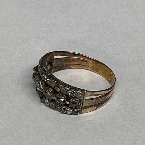 42 - A C19th unmarked yellow metal and diamond ring set throughout with the three lines of an old cut dia... 