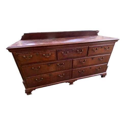 429 - A late C18th style Georgian oak chest/dresser, three short drawers over 2 banks of two short drawers... 