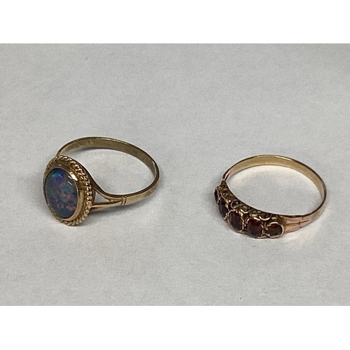 43 - A 9ct gold and black opal ring, oval black opal doublet in a bezel setting together with an unmarked... 