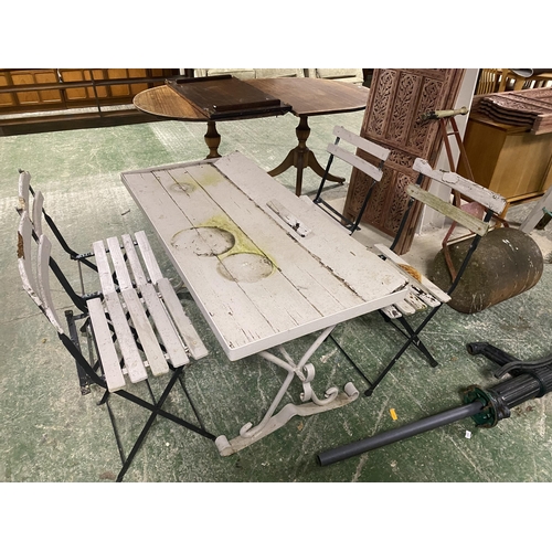 440 - A small metal conservatory coffee table and  a grey painted bistro garden table with four painted sl... 