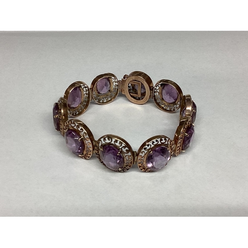 45 - An unmarked yellow metal late C19th amethyst set bracelet and an unmarked yellow metal gem set brace... 