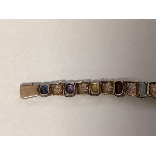 45 - An unmarked yellow metal late C19th amethyst set bracelet and an unmarked yellow metal gem set brace... 