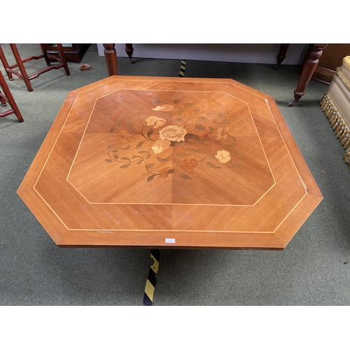 472 - A hexagonal Coffee table on single turned support with Sorento style inlaid top, 130 x 44cm