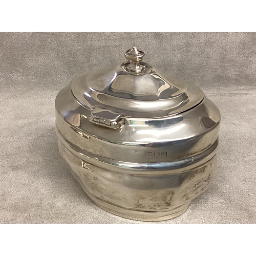 5 - A Sterling silver tea caddy together with a silver scallop dish, 95g