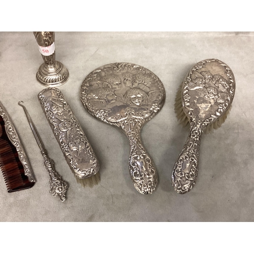 50 - A collection of Sterling silver items to include a silver dressing set, bowl, dish, comb, etc variou... 