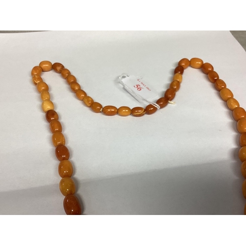 56 - A strand of graduated honey amber beads 72cm 62g