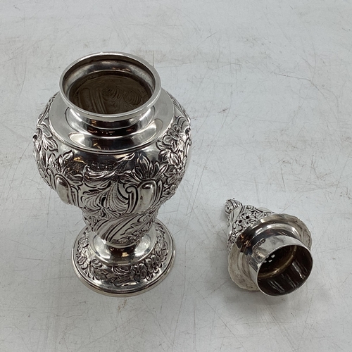 59 - Stirling silver sugar shaker with strolling chased design by Goldsmith and Silversmiths Company Lond... 