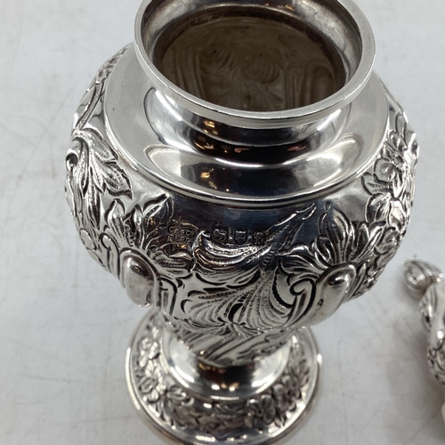 59 - Stirling silver sugar shaker with strolling chased design by Goldsmith and Silversmiths Company Lond... 