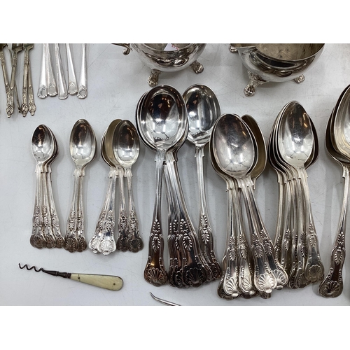 61 - Collection of silver plated items to include oval tray with pierced border, coffee pot, sugar shaker... 