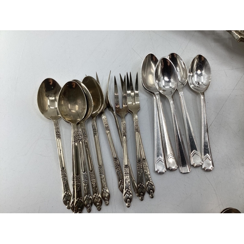 61 - Collection of silver plated items to include oval tray with pierced border, coffee pot, sugar shaker... 