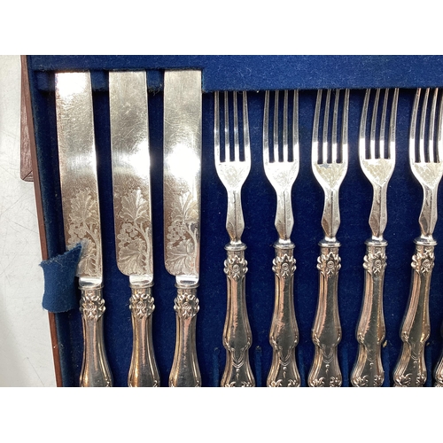 62 - Collection of boxed silver plated cutlery (4 boxes) plus one Stirling silver handled knife and fork ... 