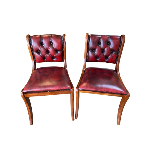 621 - Pair of Regency style mahogany framed, red leather upholstered button back hall chairs