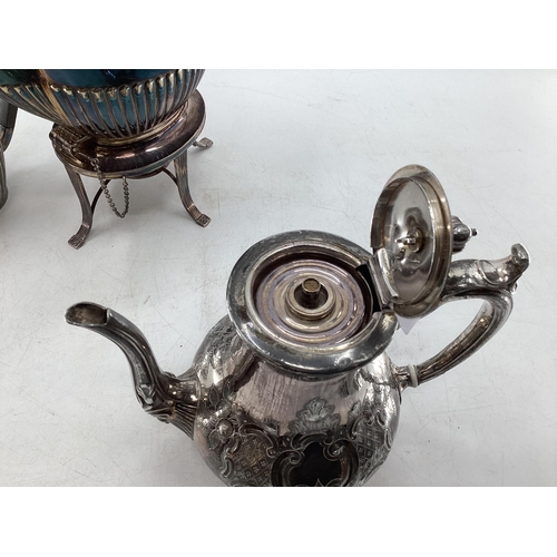 63 - Collection of silver plated wares to include kettle on burner, ornately decorated teapot and small g... 